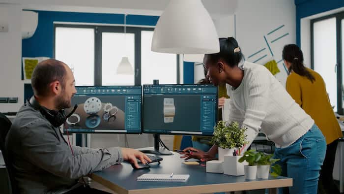 Engineers discussing their product