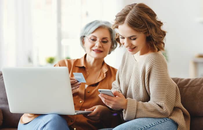 Mother and daughter shopping online